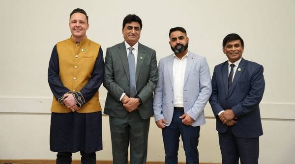 A group of men standing together

AI-generated content may be incorrect.