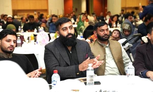 A group of people sitting at a table

AI-generated content may be incorrect.