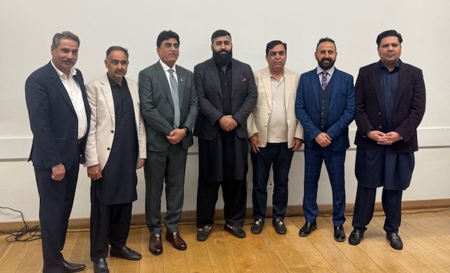 A group of men standing together

AI-generated content may be incorrect.