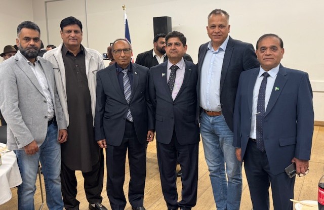 A group of men standing together

AI-generated content may be incorrect.