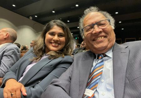 A person and person smiling at camera

AI-generated content may be incorrect.