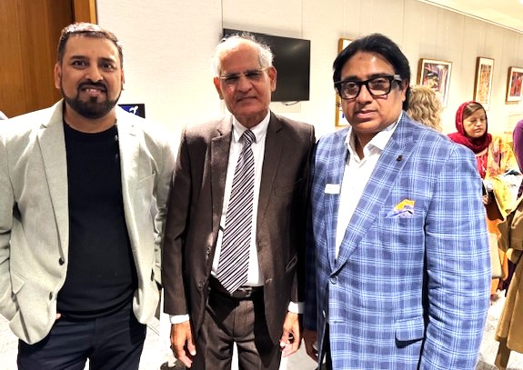 A group of men standing together

AI-generated content may be incorrect.