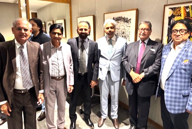 A group of people standing together

AI-generated content may be incorrect.