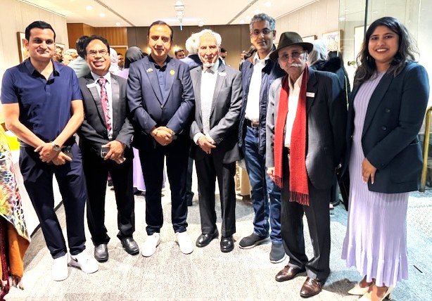 A group of people standing together

AI-generated content may be incorrect.