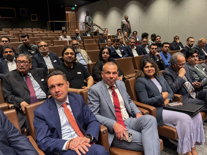 A group of people sitting in chairs

AI-generated content may be incorrect.