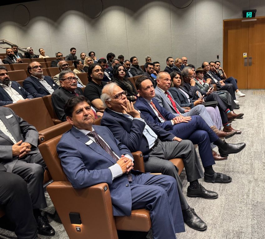 A group of people sitting in chairs

AI-generated content may be incorrect.