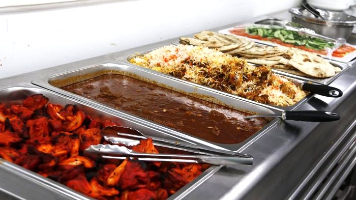 A buffet line of food

AI-generated content may be incorrect.