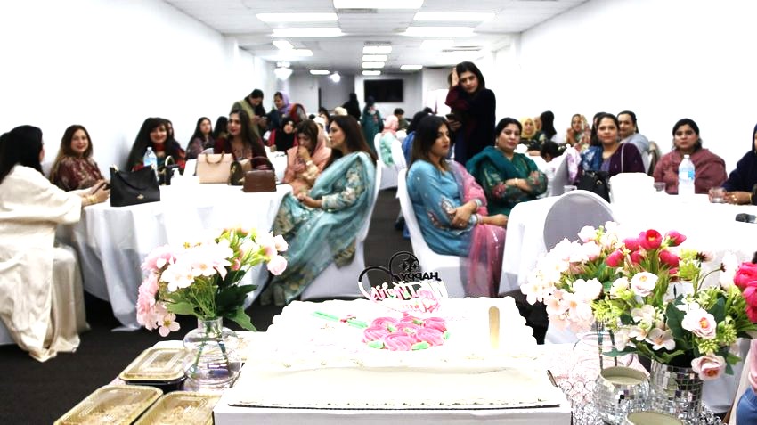 A group of women sitting in chairs

AI-generated content may be incorrect.