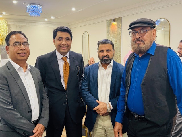 A group of men standing together

AI-generated content may be incorrect.