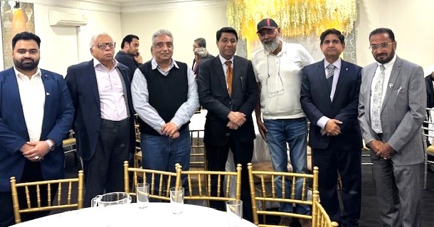 A group of men standing together

AI-generated content may be incorrect.