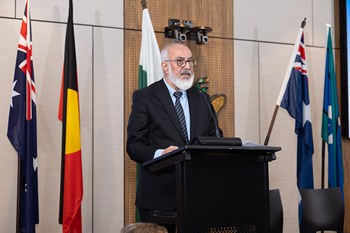 A person standing at a podium

AI-generated content may be incorrect.