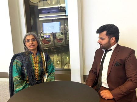 A person and person sitting at a table

AI-generated content may be incorrect.