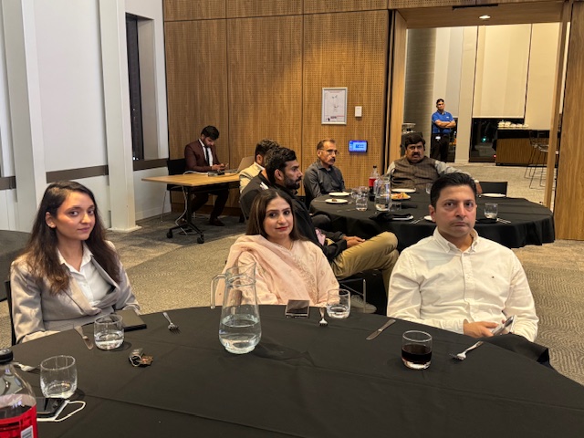 A group of people sitting at a round table

AI-generated content may be incorrect.