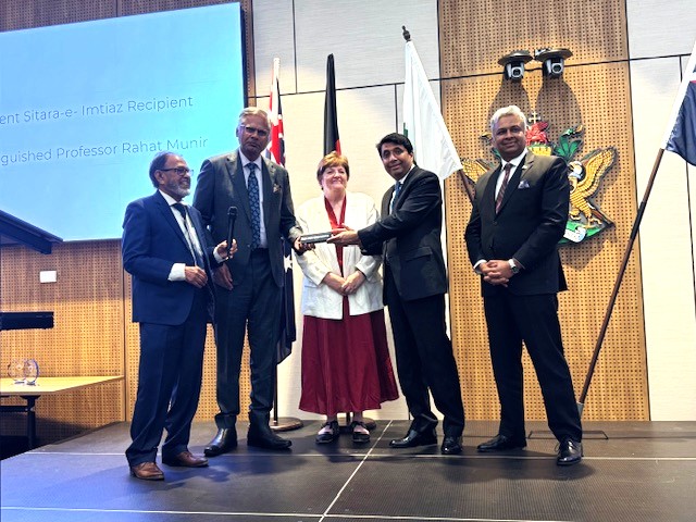 A group of people standing on a stage

AI-generated content may be incorrect.