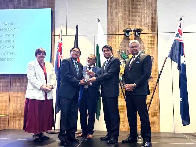 A group of people standing on a stage

AI-generated content may be incorrect.