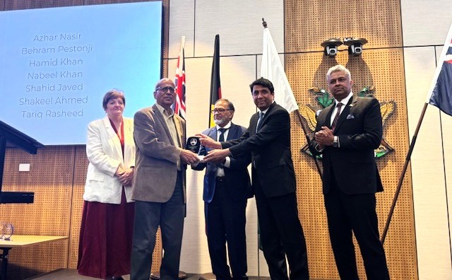 A group of people shaking hands

AI-generated content may be incorrect.