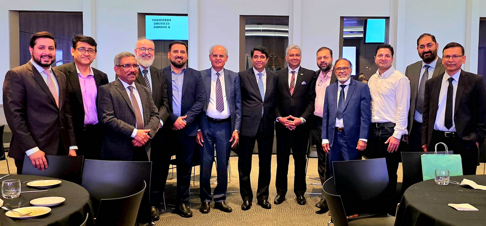 A group of men in suits

AI-generated content may be incorrect.