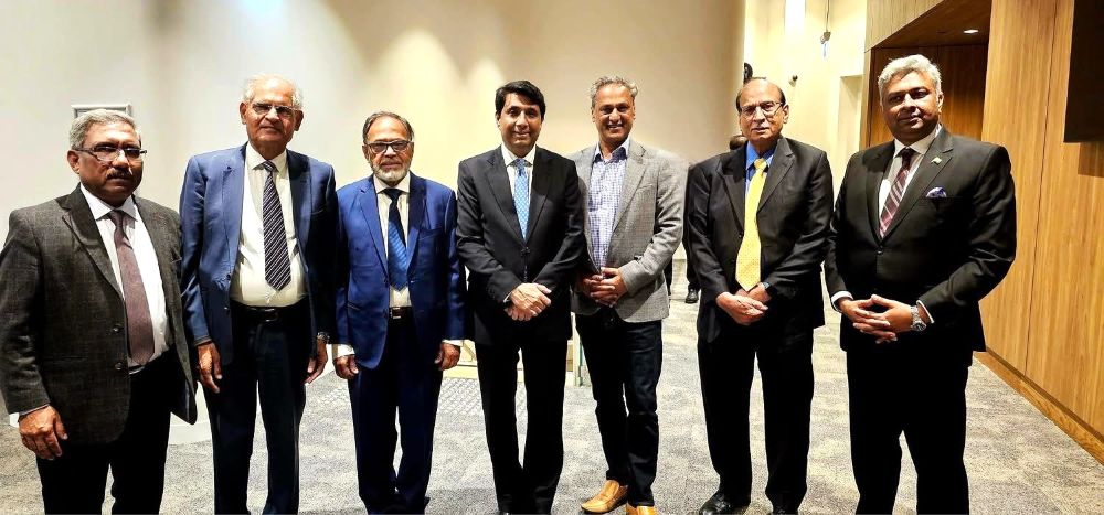 A group of men standing together

AI-generated content may be incorrect.