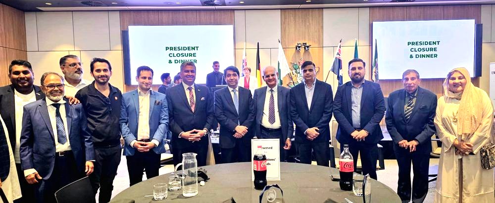 A group of men standing around a round table

AI-generated content may be incorrect.