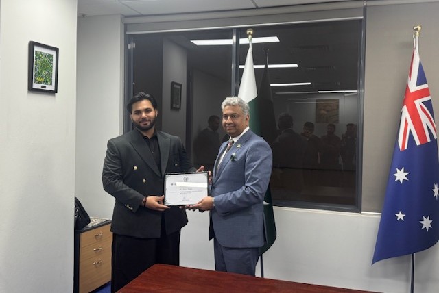 A person holding a certificate

AI-generated content may be incorrect.