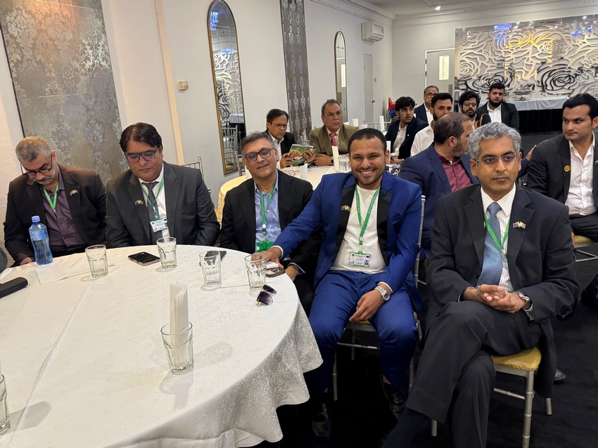 A group of men sitting at a round table

AI-generated content may be incorrect.