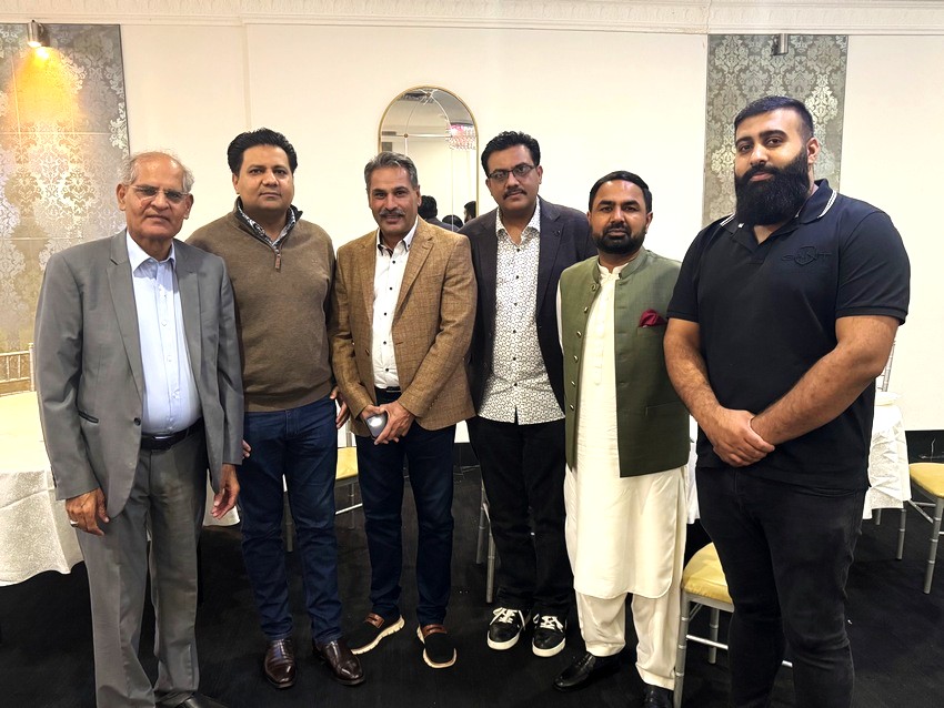 A group of men standing together

AI-generated content may be incorrect.