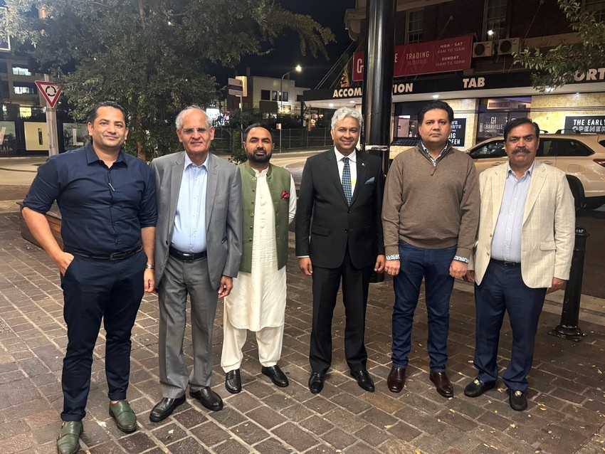 A group of men standing on a brick surface

AI-generated content may be incorrect.
