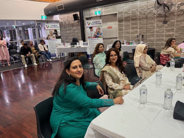 A group of women sitting at a table

AI-generated content may be incorrect.