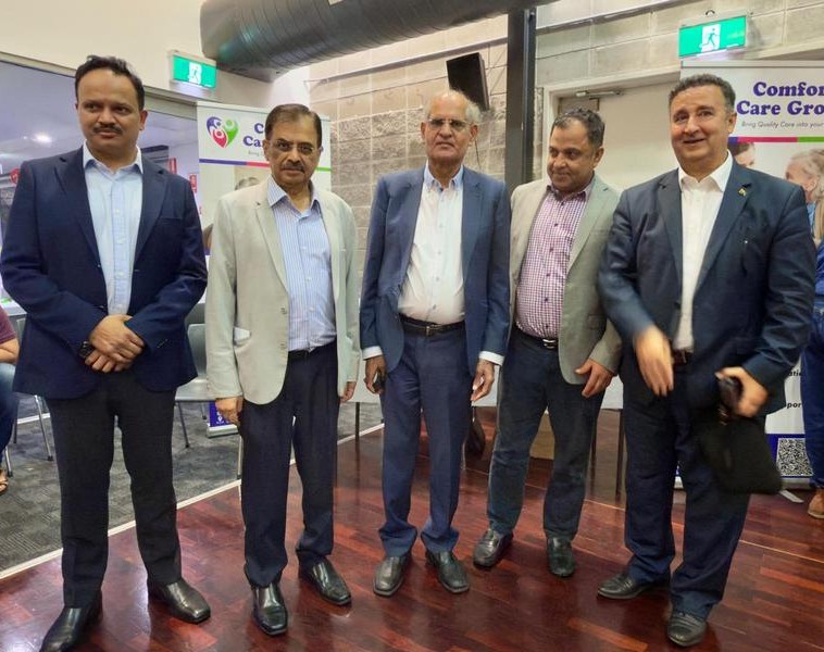 A group of men standing together

AI-generated content may be incorrect.