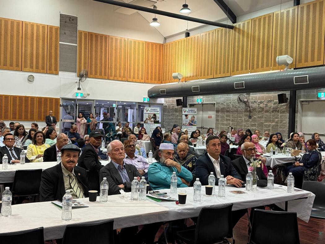 A group of people sitting at tables

AI-generated content may be incorrect.