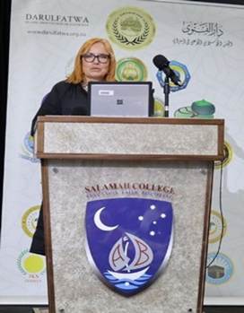 A person standing at a podium

AI-generated content may be incorrect.