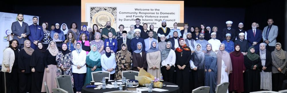 A group of people standing in front of a screen

AI-generated content may be incorrect.