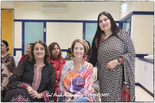 A group of women posing for a photo

AI-generated content may be incorrect.