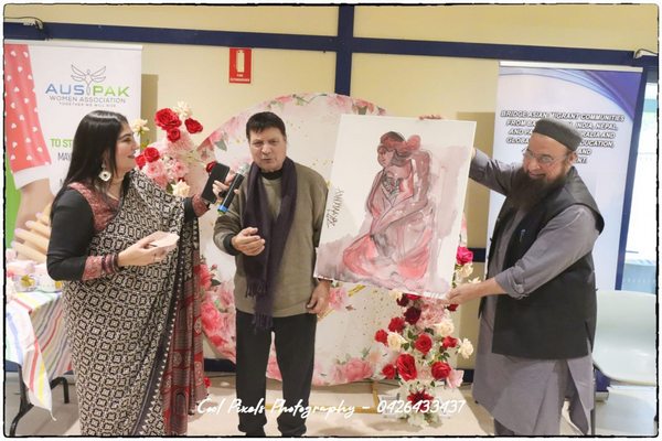 A group of people standing in front of a painting

AI-generated content may be incorrect.