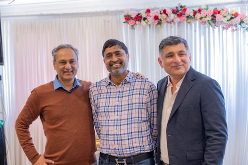 A group of men standing together

AI-generated content may be incorrect.