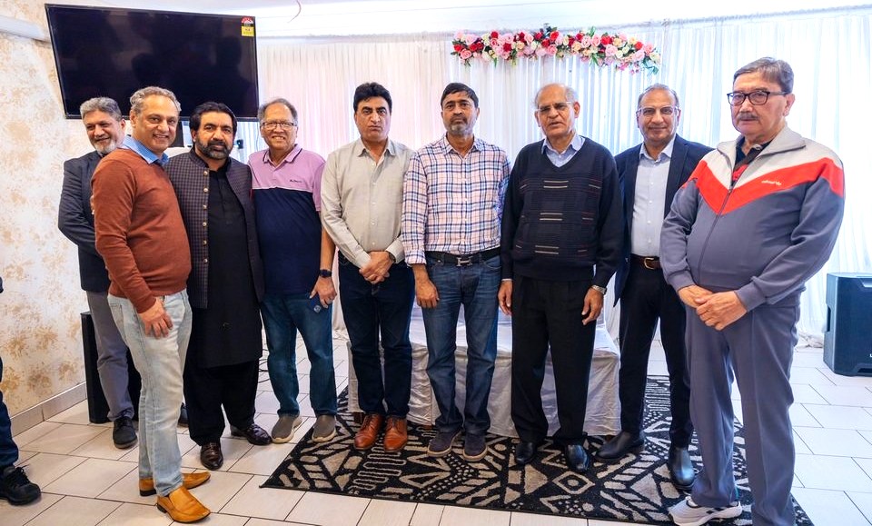 A group of men standing together

AI-generated content may be incorrect.