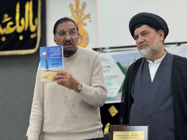 A person holding a book

AI-generated content may be incorrect.