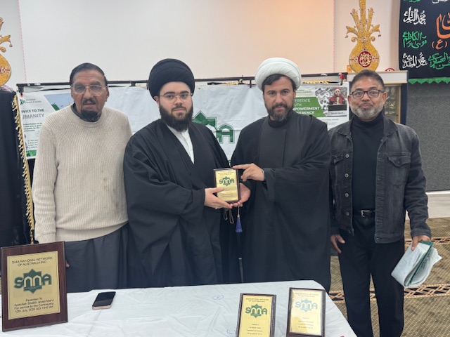 A group of men standing together

AI-generated content may be incorrect.