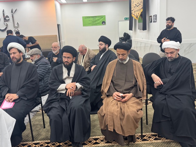 A group of men sitting in chairs

AI-generated content may be incorrect.