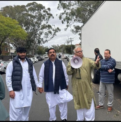 A group of men holding hands and standing in a street

AI-generated content may be incorrect.