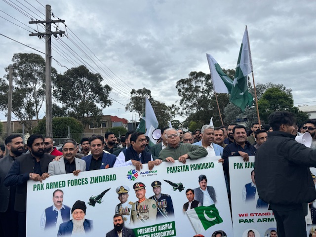 A group of people holding signs

AI-generated content may be incorrect.
