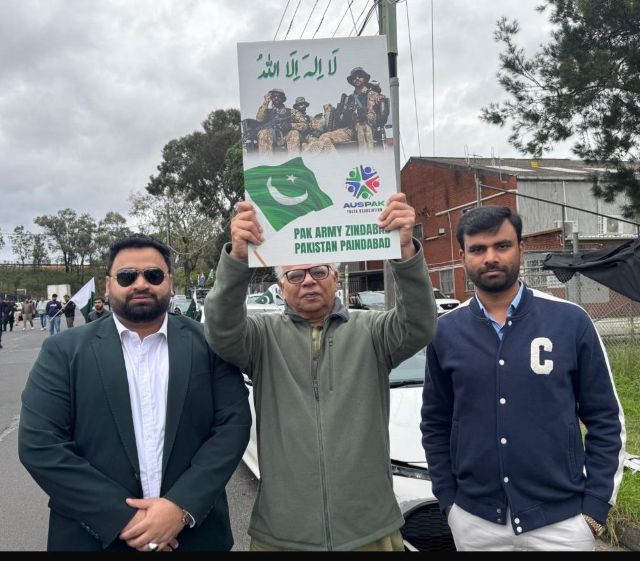 A group of men holding up a sign

AI-generated content may be incorrect.