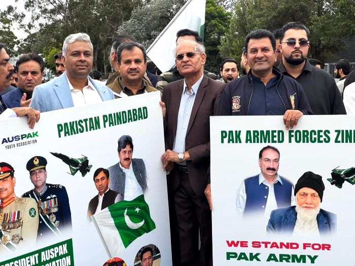 A group of men holding signs

AI-generated content may be incorrect.