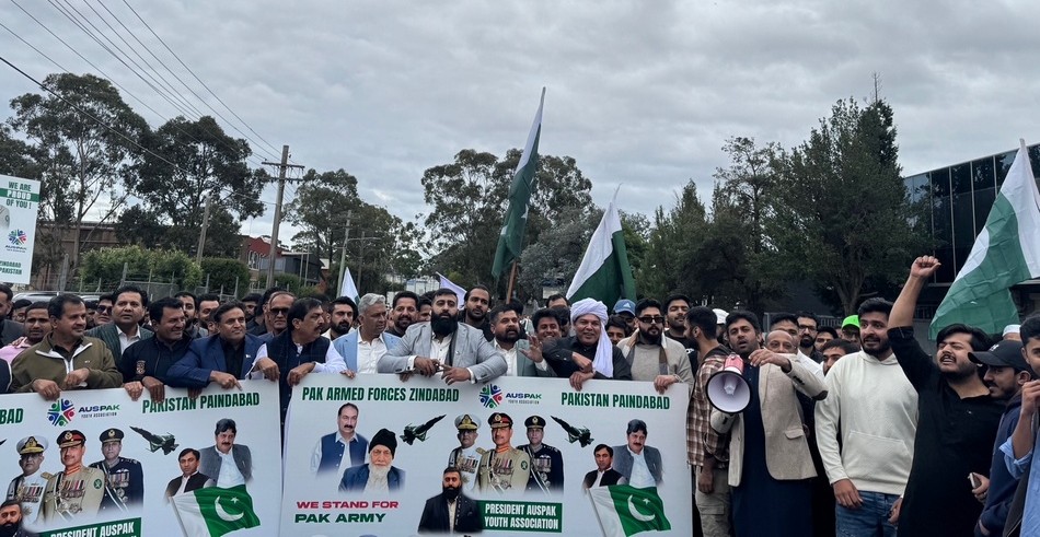 A group of people holding a sign

AI-generated content may be incorrect.