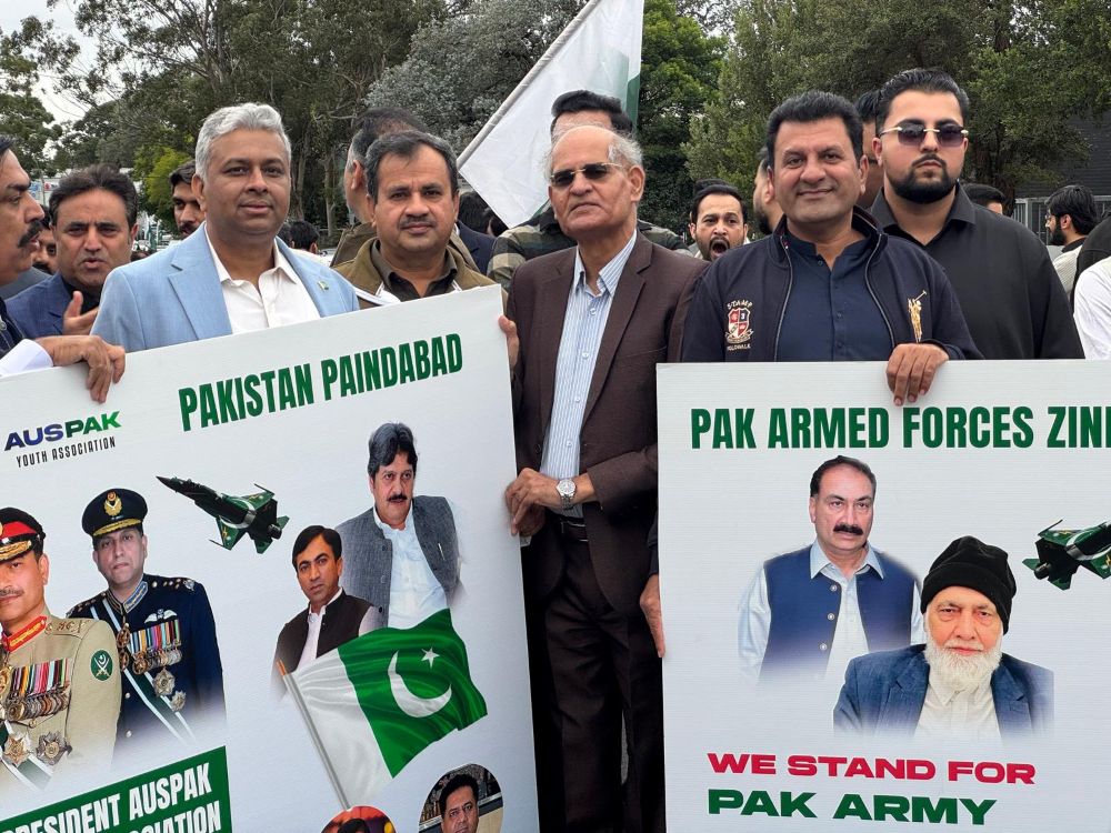 A group of men holding signs

AI-generated content may be incorrect.