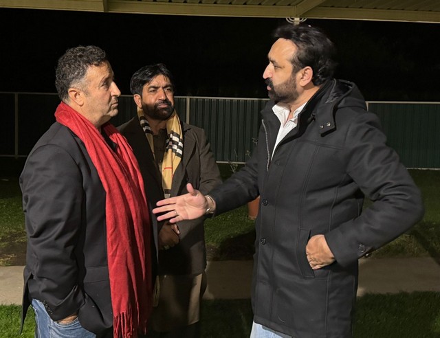 A group of men standing outside

AI-generated content may be incorrect.