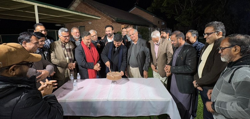 A group of people around a table

AI-generated content may be incorrect.